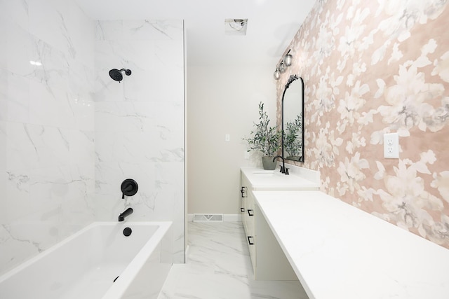 1152 E Bluebird Ln, Columbia, MO 65201 - bathroom featuring vanity, shower / bath combination, marble finish floors, wallpapered walls, and baseboards