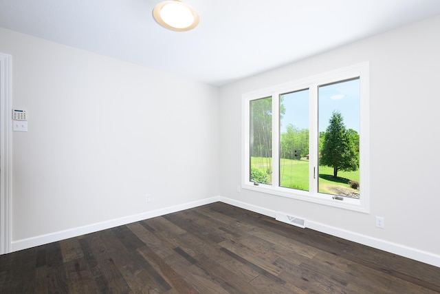 1152 E Bluebird Ln, Columbia, MO 65201 - spare room with dark wood finished floors and baseboards