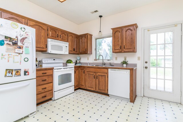 1411 Kinloch Ct, Columbia, MO 65203 - kitchen with white appliances, a sink, light flooring, and healthy amount of natural light