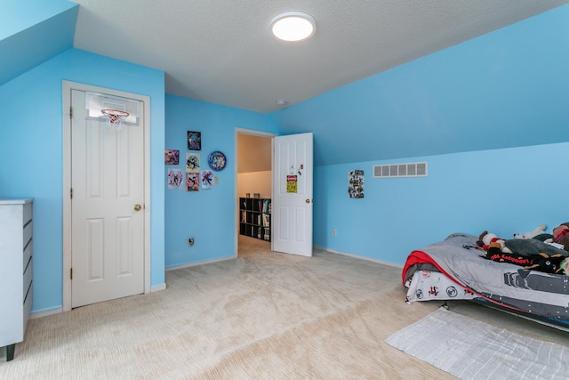 1411 Kinloch Ct, Columbia, MO 65203 - bedroom with vaulted ceiling, carpet flooring, and baseboards