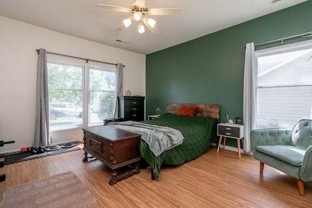 1411 Kinloch Ct, Columbia, MO 65203 - bedroom with light wood-type flooring and a ceiling fan