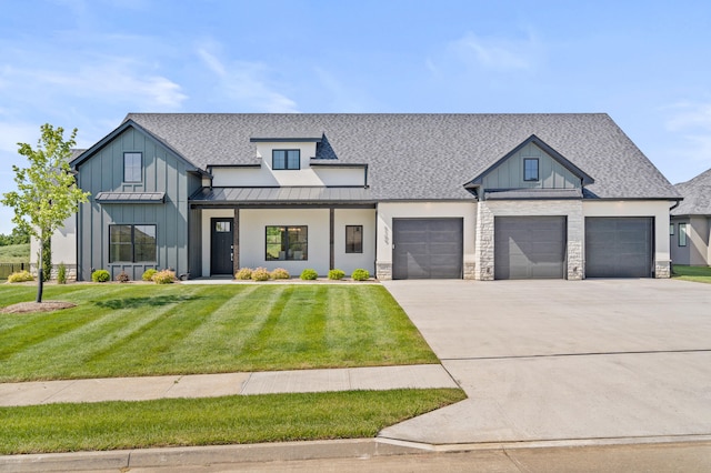 6109 Ivory Ln, Columbia, MO 65201 - modern farmhouse with a standing seam roof, concrete driveway, a front yard, and a shingled roof