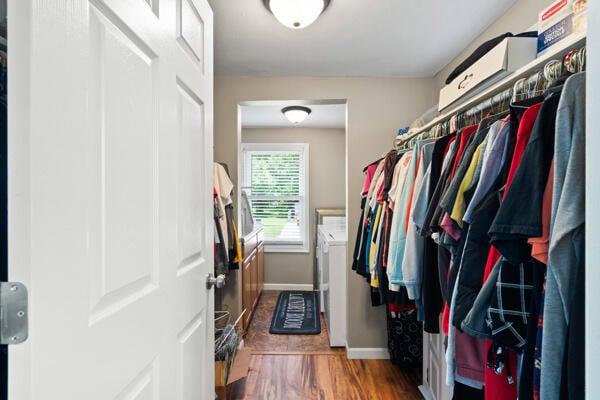 105 W Johnson Ave, Ashland, MO 65010 - spacious closet featuring independent washer and dryer and wood finished floors