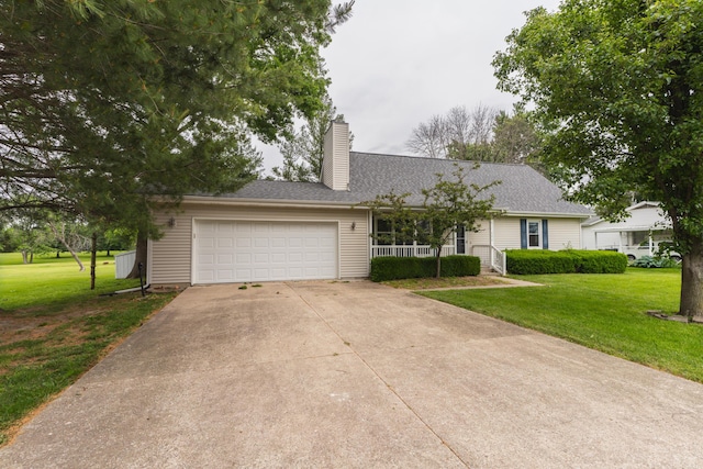 606 Wientz St, Moberly, MO 65270 - ranch-style home with a chimney, driveway, a front yard, and an attached garage