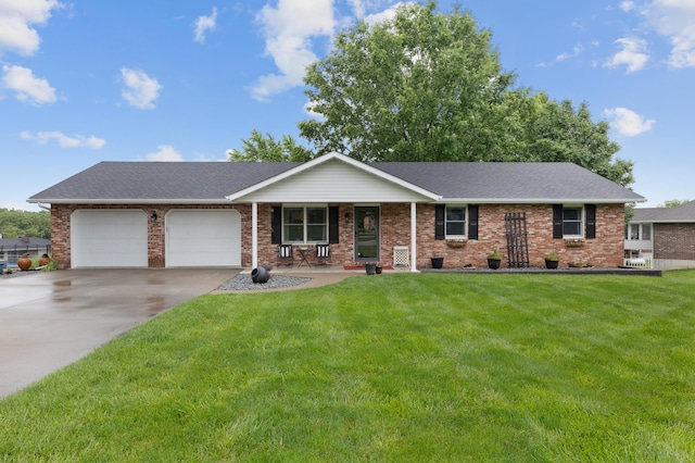 109 N Linnwood Dr, Linn, MO 65051 - ranch-style house featuring an attached garage, driveway, a front yard, and brick siding