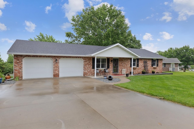 109 N Linnwood Dr, Linn, MO 65051 - single story home featuring an attached garage, brick siding, concrete driveway, and a front yard