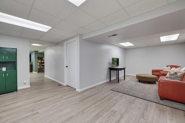 109 N Linnwood Dr, Linn, MO 65051 - sitting room featuring a drop ceiling, wood finished floors, and baseboards