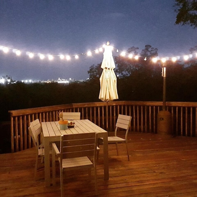 2416 Cimarron Dr, Columbia, MO 65203 - deck at night with outdoor dining area