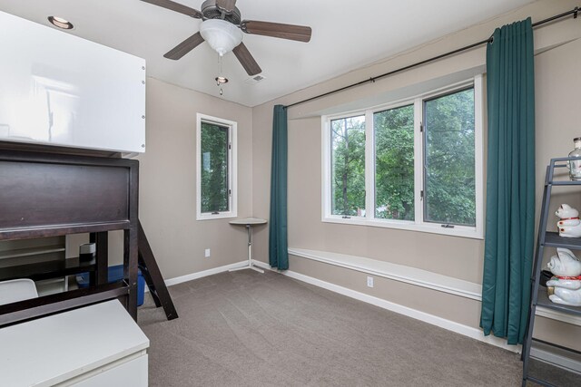 2416 Cimarron Dr, Columbia, MO 65203 - unfurnished bedroom with baseboards, carpet, and a ceiling fan