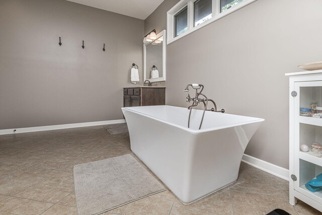 2416 Cimarron Dr, Columbia, MO 65203 - laundry room featuring baseboards and a sink
