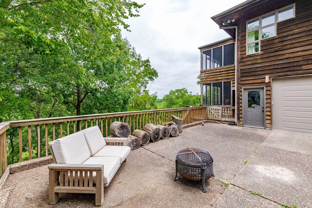 2416 Cimarron Dr, Columbia, MO 65203 - view of patio / terrace featuring an outdoor living space with a fire pit and a sunroom