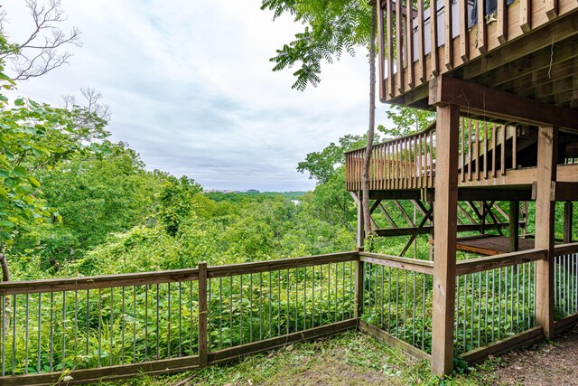 2416 Cimarron Dr, Columbia, MO 65203 - deck with stairs and a view of trees