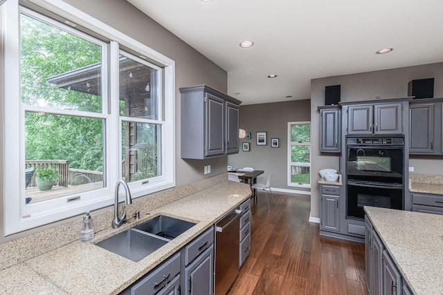 2416 Cimarron Dr, Columbia, MO 65203 - kitchen featuring gray cabinets, a sink, stainless steel dishwasher, dark wood-type flooring, and recessed lighting