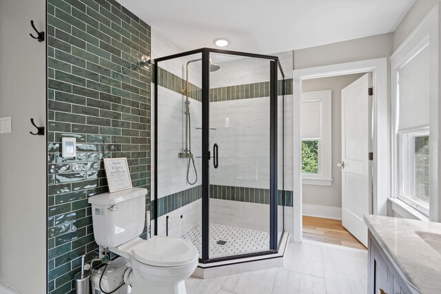 303 S Glenwood Ave, Columbia, MO 65203 - bathroom featuring a stall shower and vanity