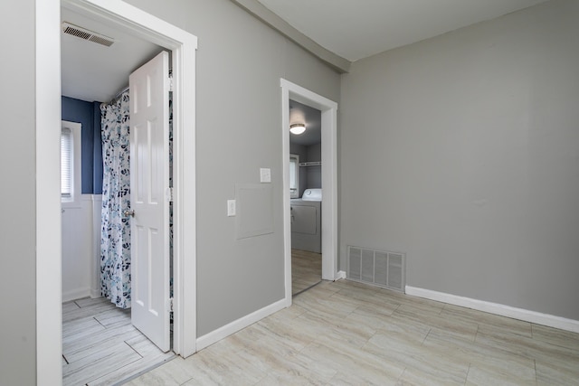 500 W Sexton Rd, Columbia, MO 65203 - hall with washer / clothes dryer and baseboards