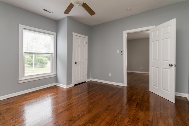 500 W Sexton Rd, Columbia, MO 65203 - spare room featuring a ceiling fan, dark wood finished floors, and baseboards