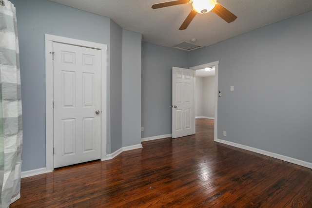 500 W Sexton Rd, Columbia, MO 65203 - unfurnished bedroom with wood-type flooring, baseboards, and ceiling fan
