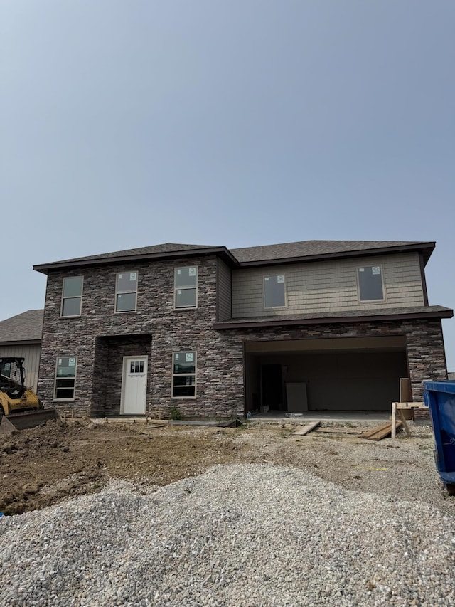 5895 Hamstead Heath Ct, Ashland, MO 65010 - view of front of property featuring stone siding and a garage