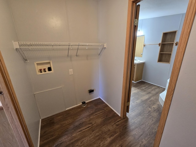 5181 N Jasmine Way, Columbia, MO 65202 - washroom featuring dark wood-style flooring, hookup for a washing machine, and hookup for an electric dryer