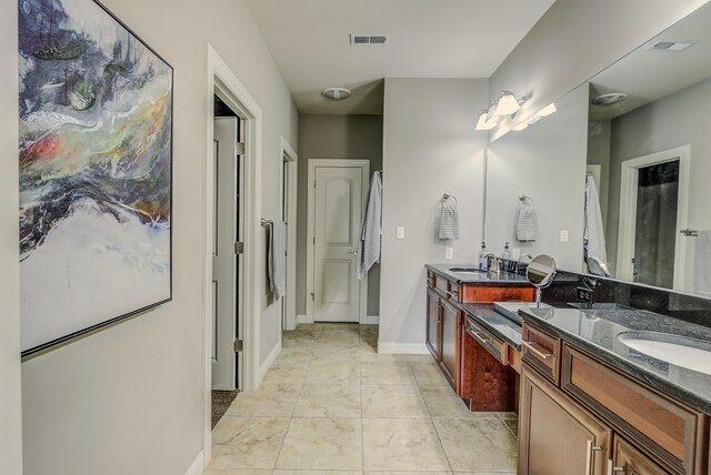 1904 Talco Dr, Columbia, MO 65201 - full bath featuring double vanity and baseboards