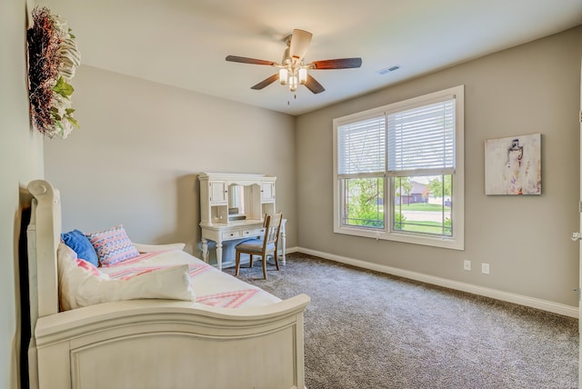 1904 Talco Dr, Columbia, MO 65201 - carpeted bedroom with baseboards and a ceiling fan