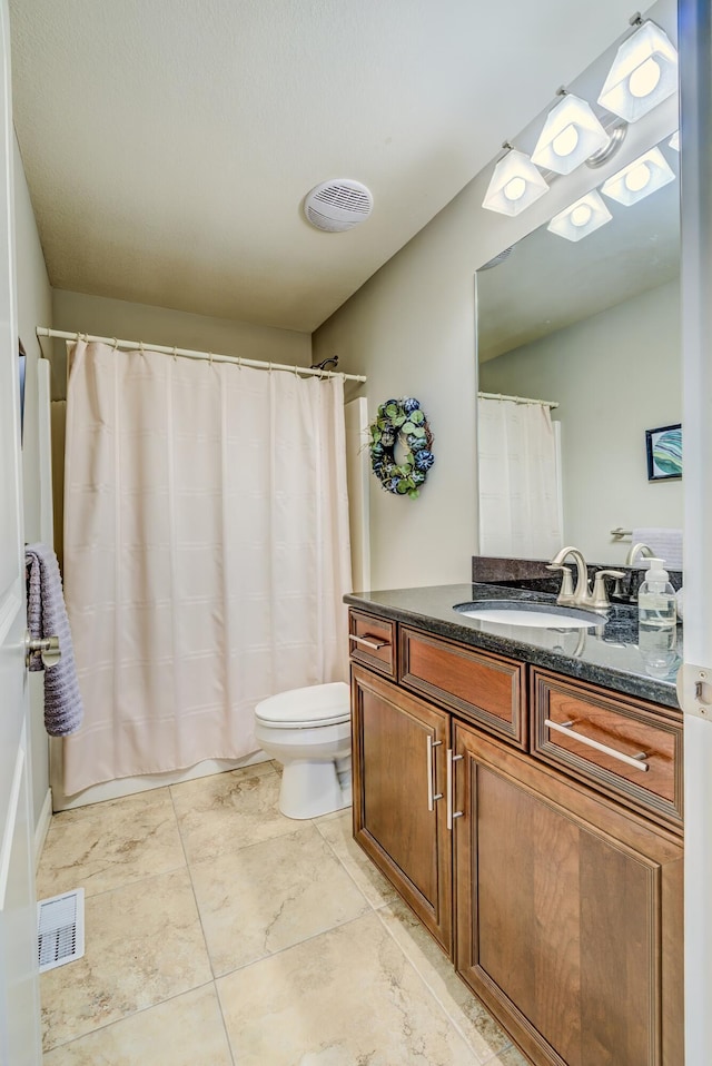 1904 Talco Dr, Columbia, MO 65201 - bathroom with toilet, vanity, and a shower with curtain