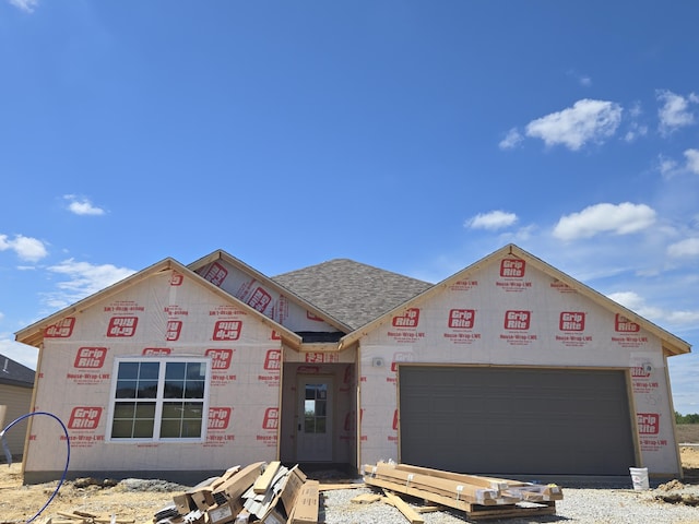 3231 Napoli Dr, Columbia, MO 65202 - property under construction featuring an attached garage and roof with shingles