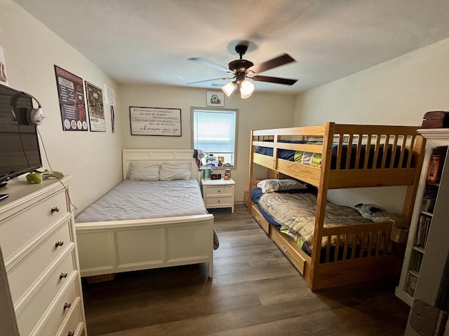 11630 N Varnon School Rd, Hallsville, MO 65255 - bedroom featuring dark wood-type flooring and a ceiling fan