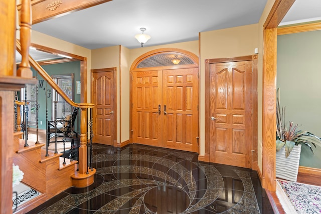 70 E High Point Ln, Columbia, MO 65203 - foyer entrance featuring stairway, granite tiled floors, and baseboards