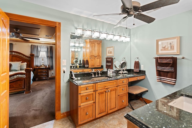 70 E High Point Ln, Columbia, MO 65203 - bathroom featuring a ceiling fan, vanity, and ensuite bathroom