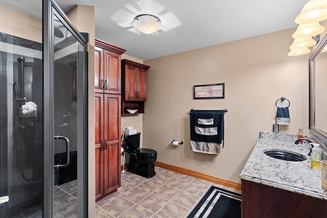 70 E High Point Ln, Columbia, MO 65203 - full bathroom with vanity, a shower stall, baseboards, and toilet