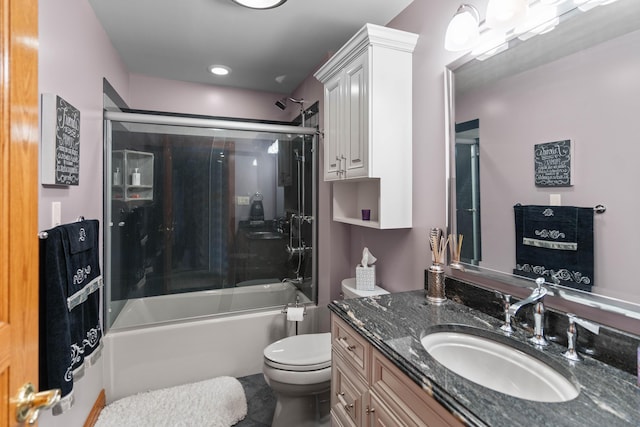 70 E High Point Ln, Columbia, MO 65203 - bathroom featuring toilet, vanity, tile patterned floors, and bath / shower combo with glass door