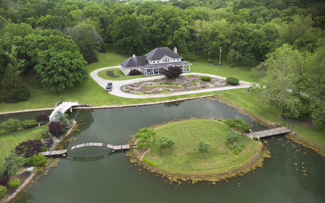 70 E High Point Ln, Columbia, MO 65203 - aerial view of property and surrounding area with a forest and a nearby body of water
