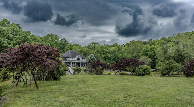 70 E High Point Ln, Columbia, MO 65203 - view of grassy yard featuring a wooded view