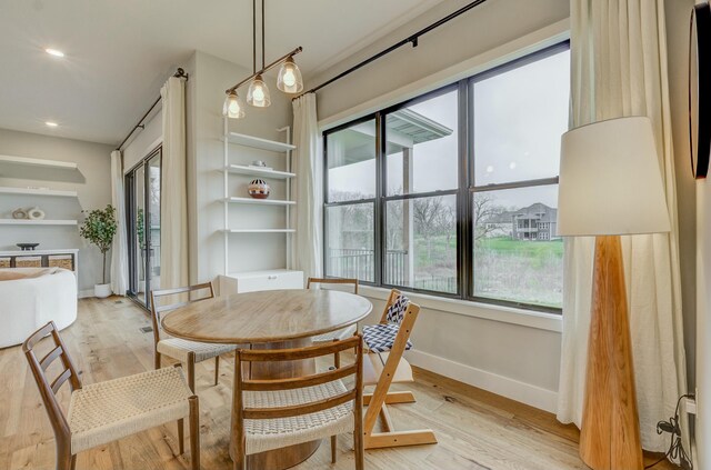 214 Hellwig Ln, Columbia, MO 65203 - dining space with baseboards, light wood-style flooring, and recessed lighting
