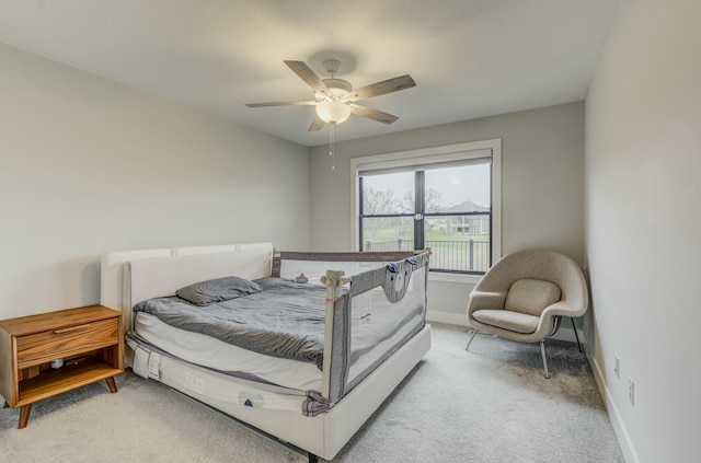 214 Hellwig Ln, Columbia, MO 65203 - bedroom featuring light carpet, baseboards, and ceiling fan