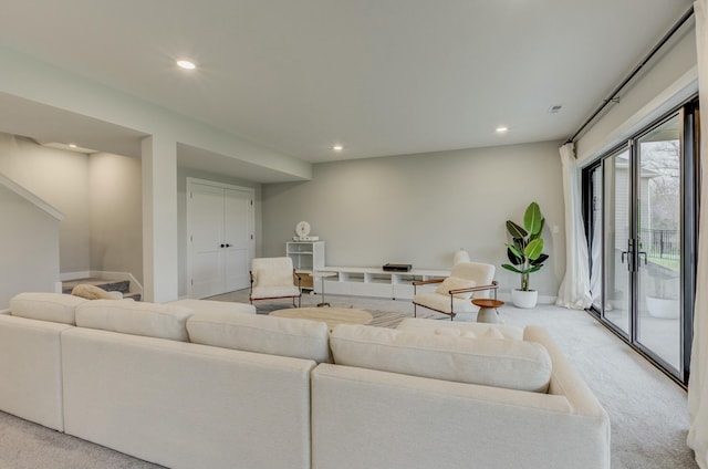 214 Hellwig Ln, Columbia, MO 65203 - living area with light colored carpet, recessed lighting, stairs, and baseboards
