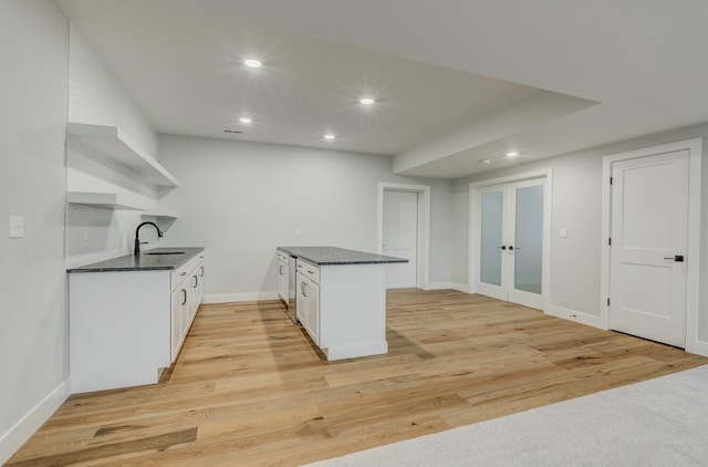 214 Hellwig Ln, Columbia, MO 65203 - kitchen featuring a sink, open shelves, french doors, recessed lighting, and white cabinets