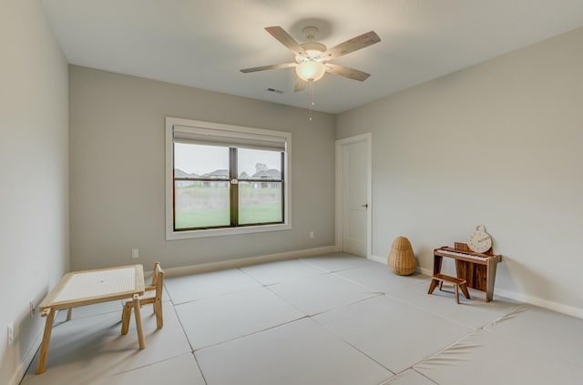 214 Hellwig Ln, Columbia, MO 65203 - spare room with a ceiling fan, baseboards, and light tile patterned floors