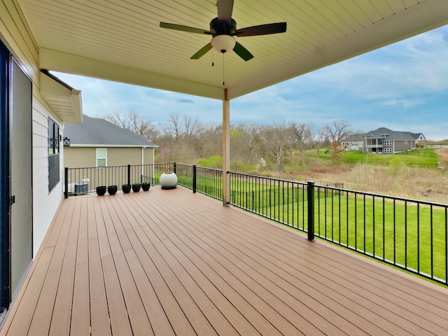 214 Hellwig Ln, Columbia, MO 65203 - wooden deck featuring a ceiling fan and a lawn