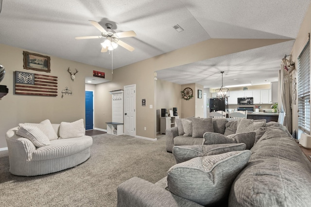 1807 E Phoenix Rd, Columbia, MO 65202 - living area featuring carpet, a ceiling fan, baseboards, and a chandelier
