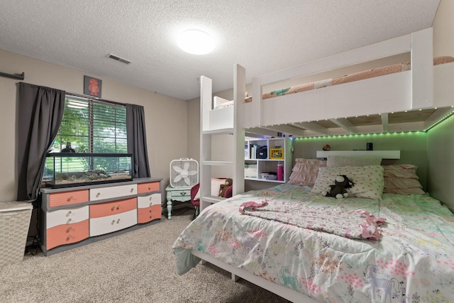 1807 E Phoenix Rd, Columbia, MO 65202 - carpeted bedroom with a textured ceiling