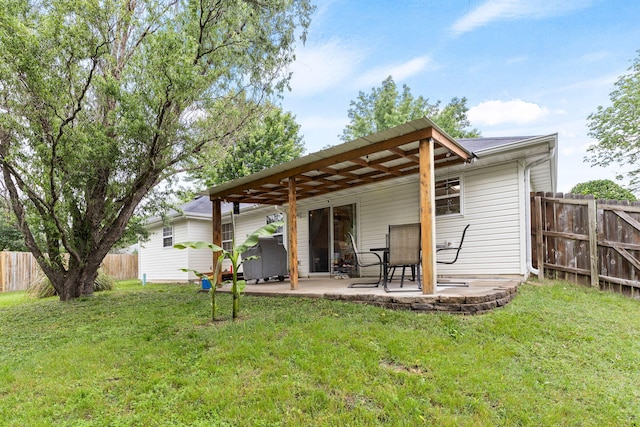 1807 E Phoenix Rd, Columbia, MO 65202 - rear view of property featuring a patio