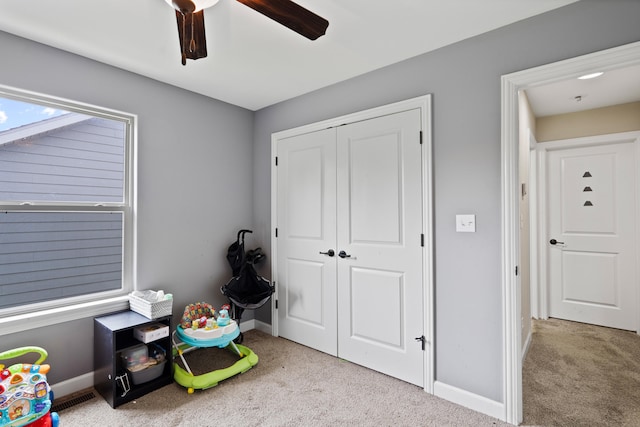7400 Pemberton Dr, Columbia, MO 65203 - recreation room with carpet floors, ceiling fan, and baseboards