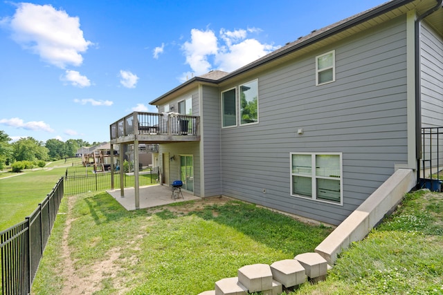 7400 Pemberton Dr, Columbia, MO 65203 - back of property with a patio and a deck