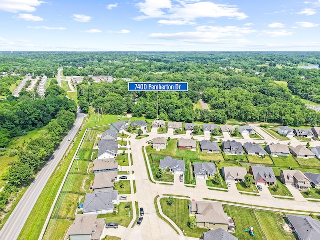 7400 Pemberton Dr, Columbia, MO 65203 - aerial perspective of suburban area featuring a heavily wooded area