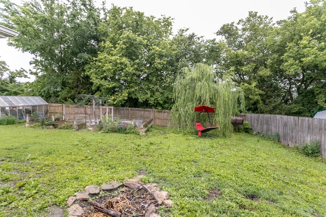 205 Jameson Dr, Ashland, MO 65010 - view of yard with an exterior structure, an outbuilding, and a vegetable garden