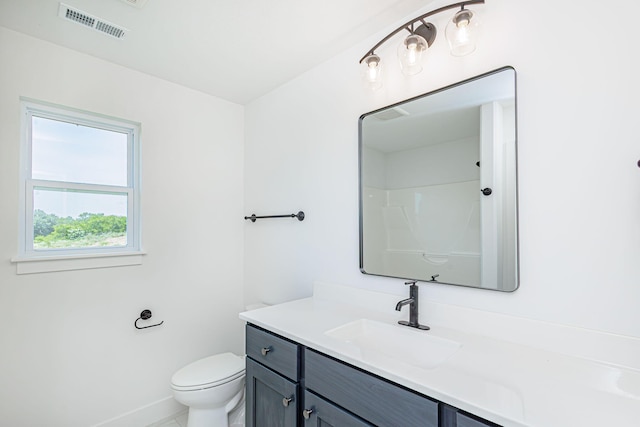 4505 Chambers Bay Dr, Columbia, MO 65201 - bathroom featuring vanity, toilet, and baseboards