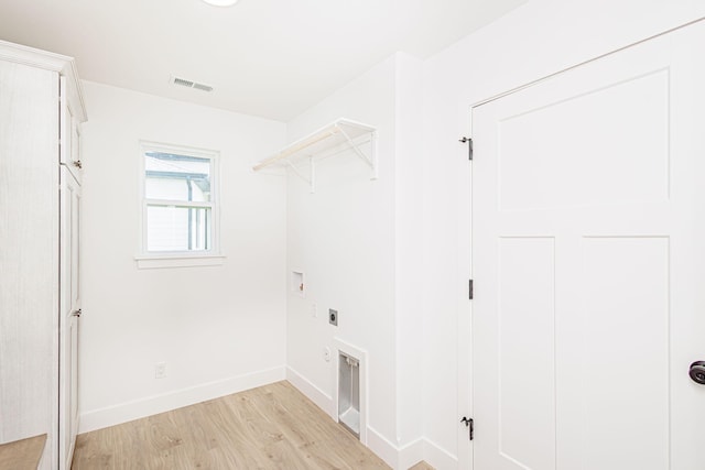 4505 Chambers Bay Dr, Columbia, MO 65201 - washroom featuring electric dryer hookup, hookup for a washing machine, light wood-type flooring, and baseboards