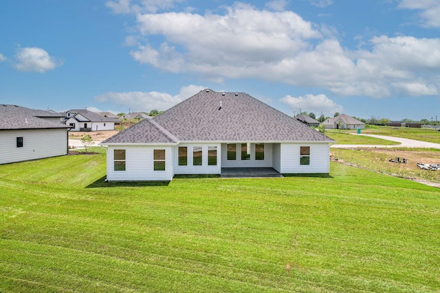 4505 Chambers Bay Dr, Columbia, MO 65201 - back of property with a yard and a shingled roof